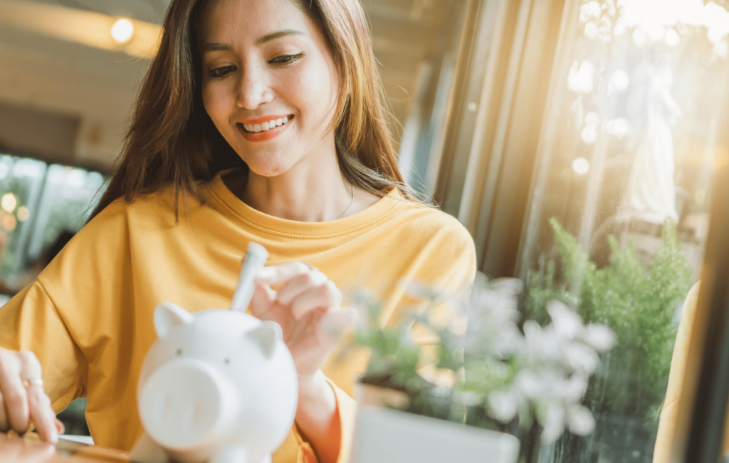 can't afford to save money - woman piggy bank