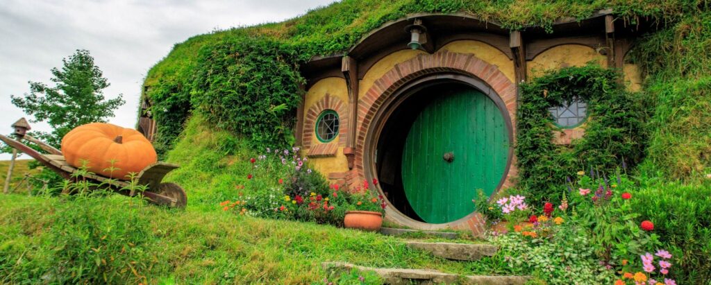 a view of a house at the Hobbiton movie set