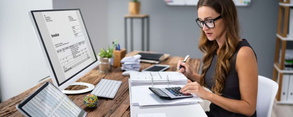 an accountant working with a calculator