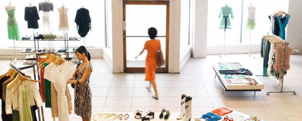 a view of a clothing store with customers browsing