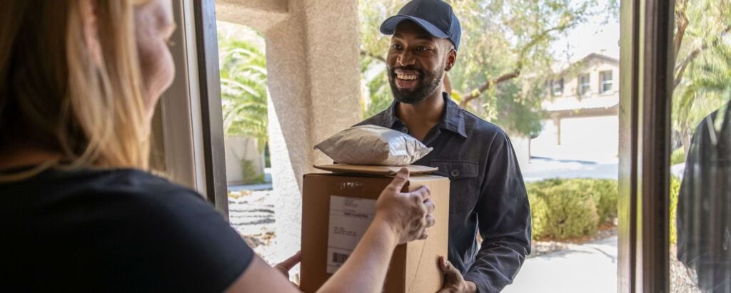 a man delivering packages to clients