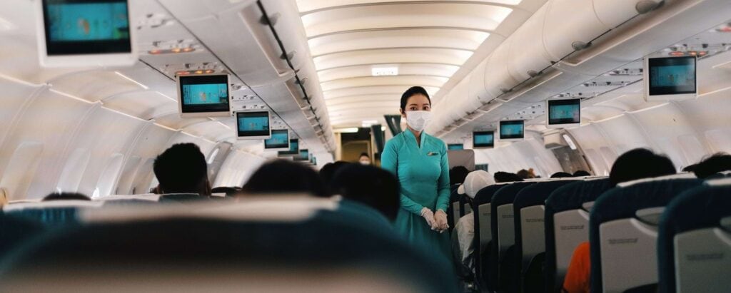 a flight attendant on an airplane - How Many Jobs Are Available In Consumer Services
