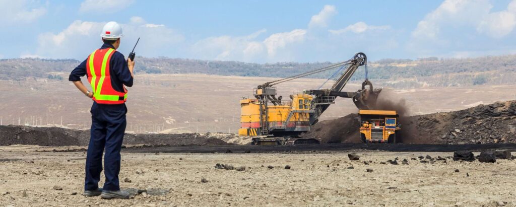 a mining engineer overseeing mining work