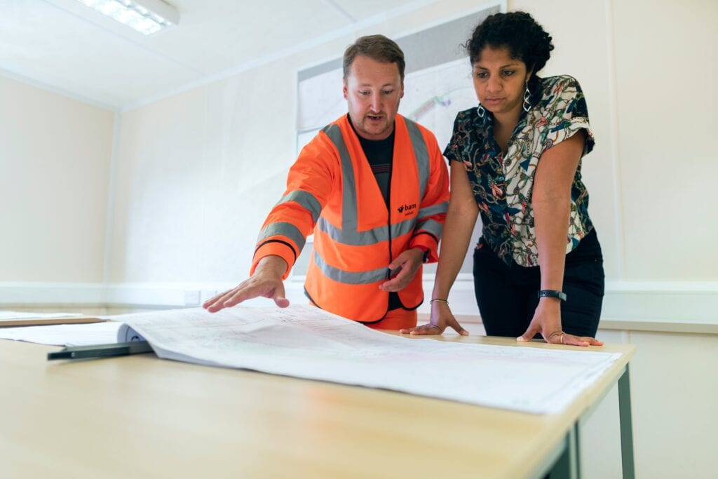 two engineers working on a project in a semiconductors company